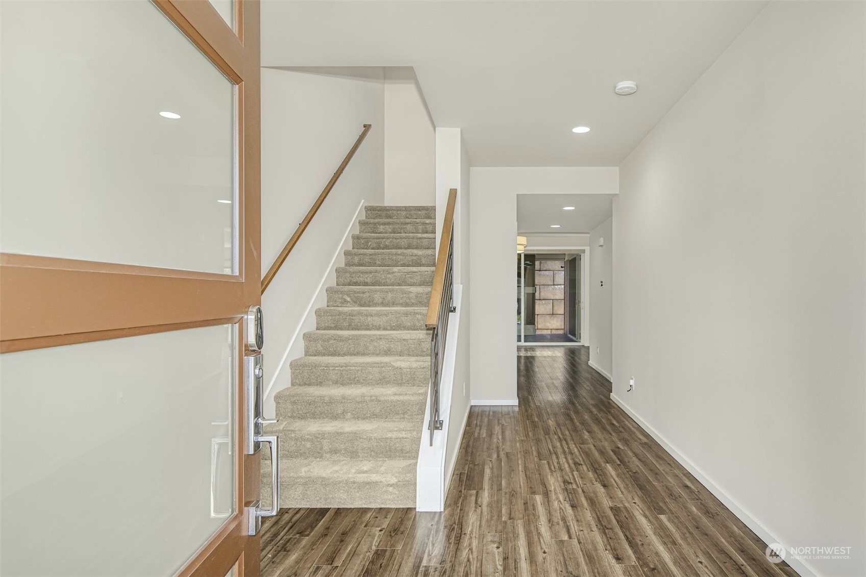 17025 40th Drive Southeast Bothell, WA 98012 - Photo 6 of 38 a view of a hallway with wooden floor and entryway