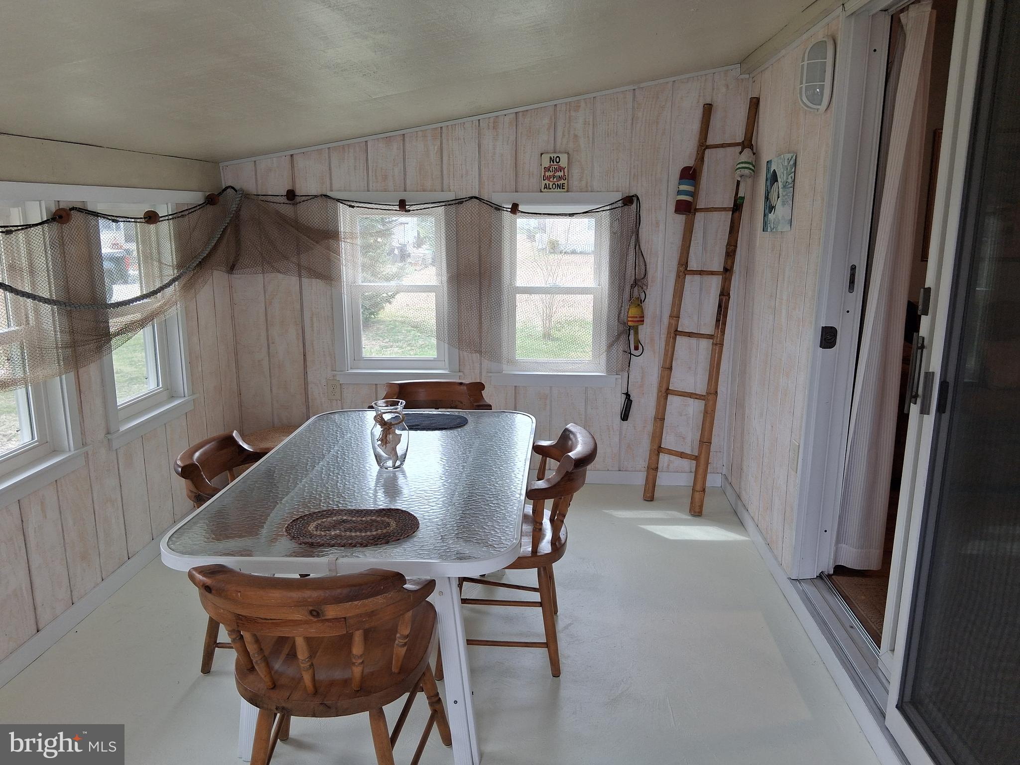 37072 Clubhouse Road Ocean View, DE 19970 - Photo 11 of 35 Enclosed Porch