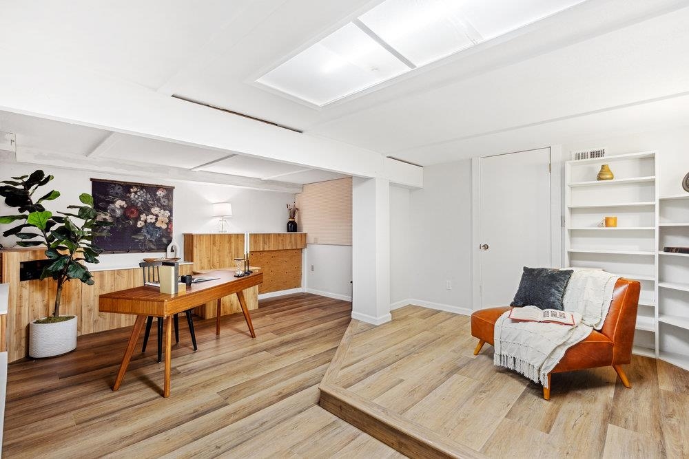12068 Pine Forest Road Truckee, CA 96161 - Photo 21 of 27 a living room with furniture and wooden floor