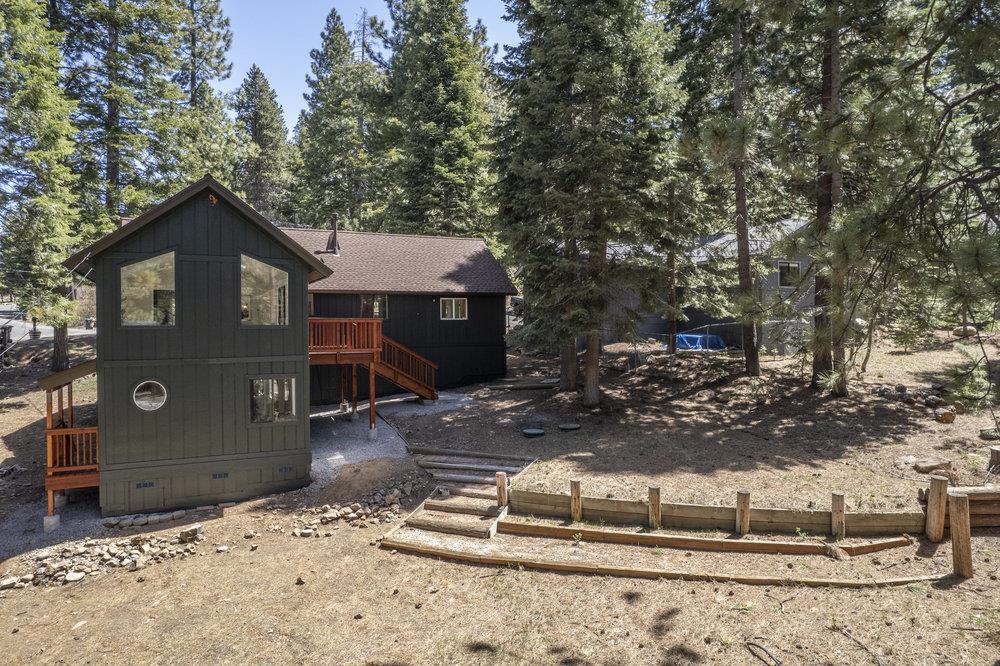 12068 Pine Forest Road Truckee, CA 96161 - Photo 25 of 27 a view of a house with a yard