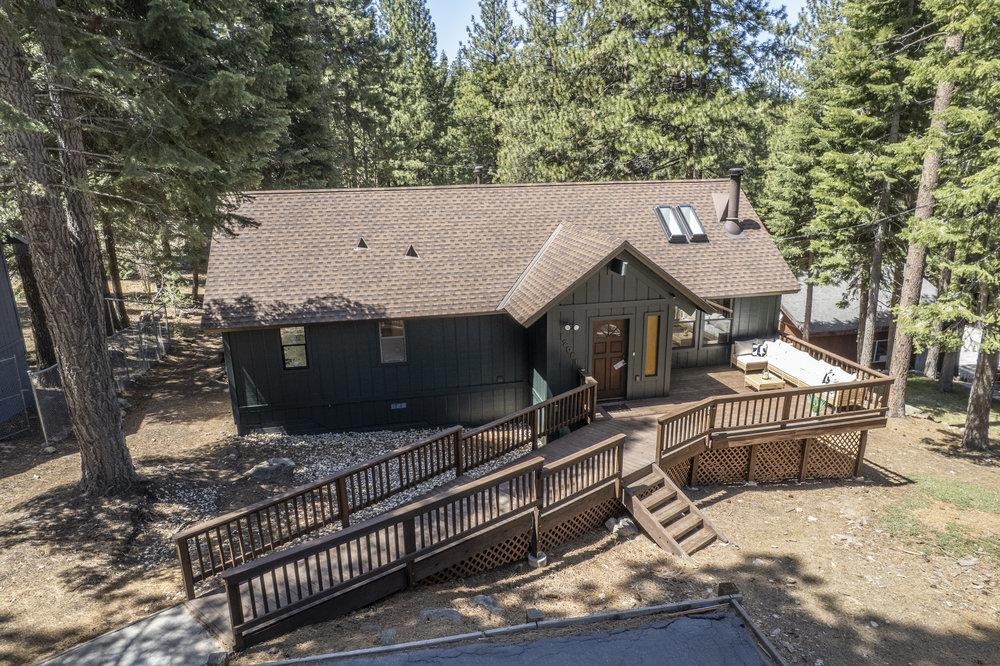 12068 Pine Forest Road Truckee, CA 96161 - Photo 26 of 27 a view of house with yard outdoor seating and barbeque oven
