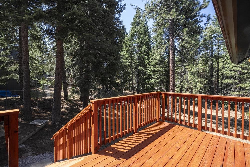 12068 Pine Forest Road Truckee, CA 96161 - Photo 7 of 27 a view of balcony with wooden floor and outdoor space