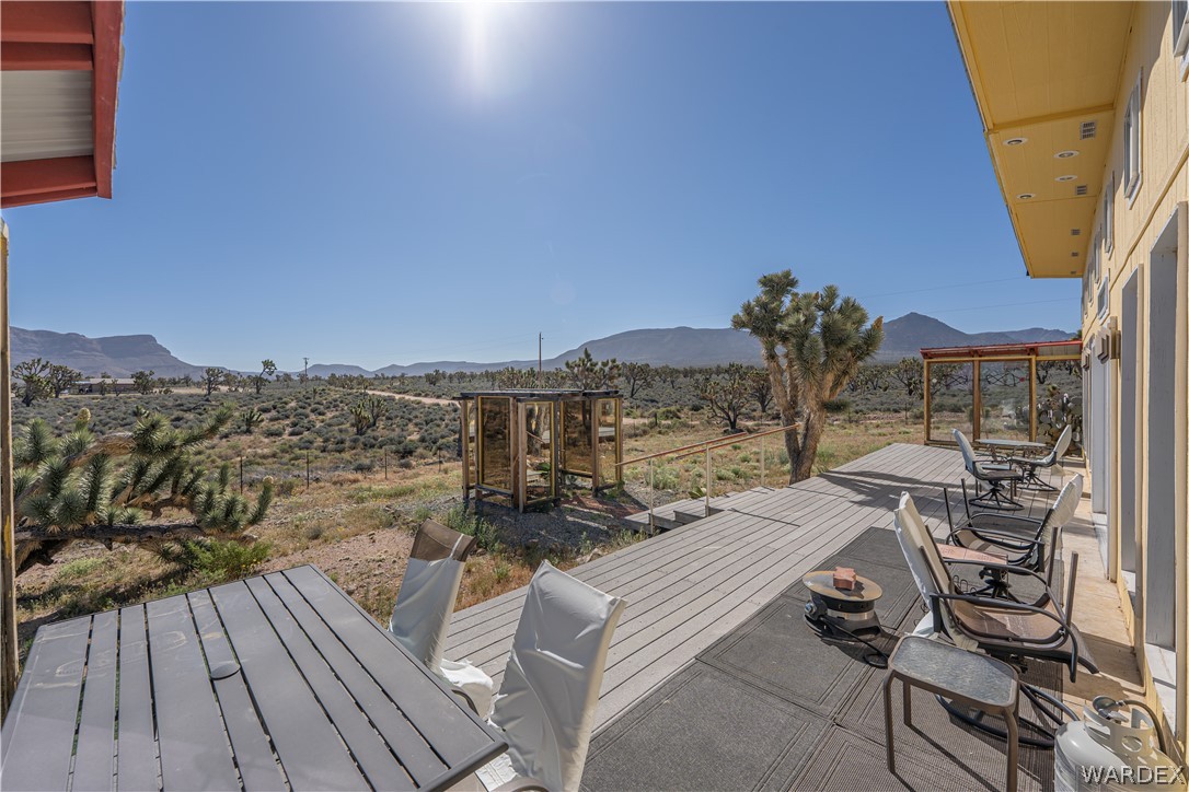 26512 North Yucca Road Meadview, AZ 86444 - Photo 13 of 38 The property features an expansive deck with mountain views and desert landscape