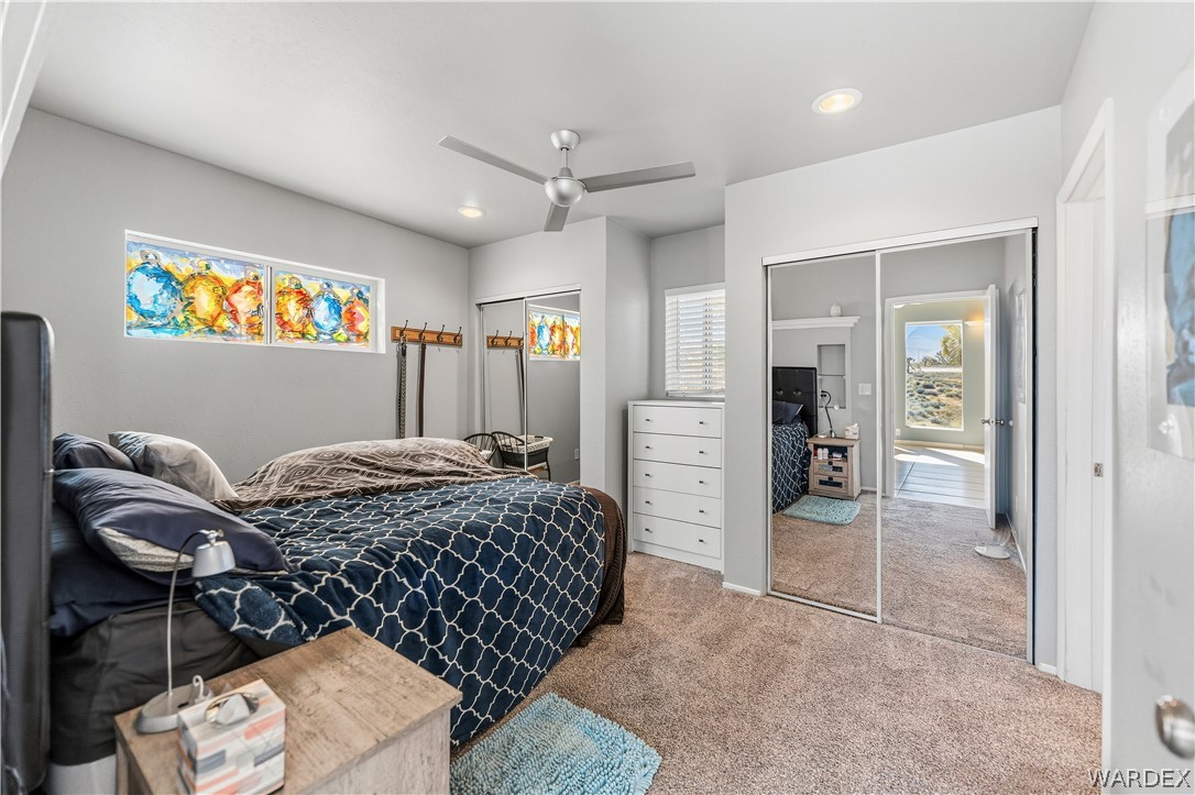 26512 North Yucca Road Meadview, AZ 86444 - Photo 29 of 38 The bedroom features carpeting, recessed lighting, and a ceiling fan