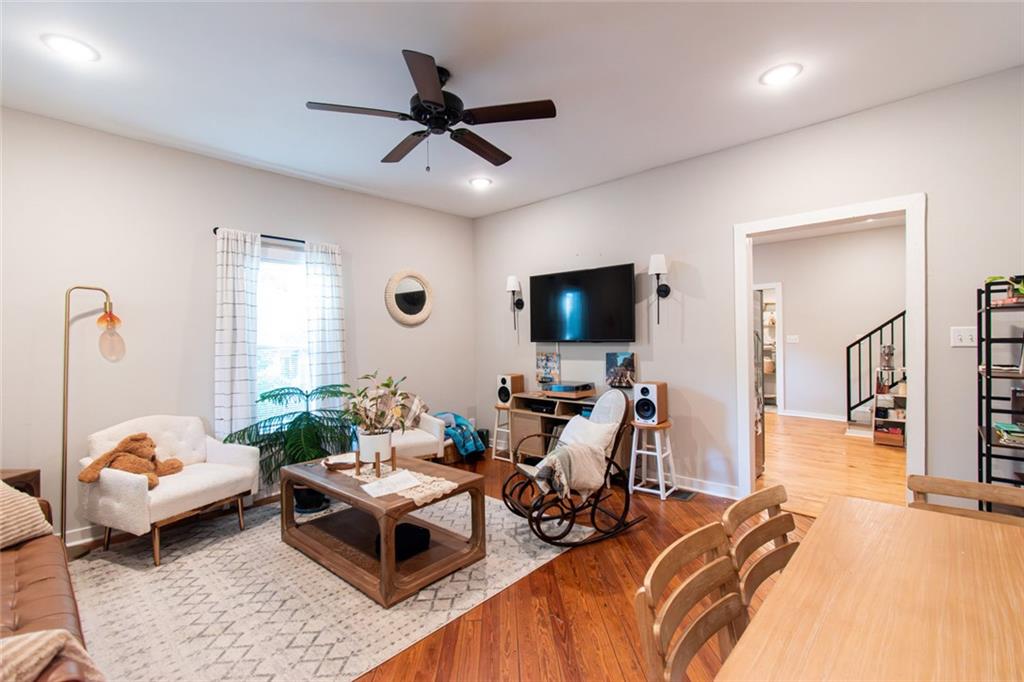 702 Radford Street Monroe, GA 30655 - Photo 5 of 49 a living room with furniture and a flat screen tv