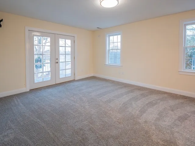 a bathroom with a bathtub a sink a vanity and a shower
