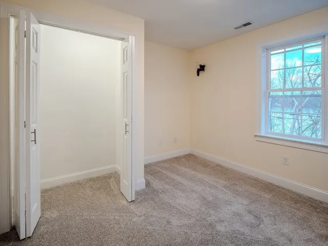 a view of a livingroom with a staircase