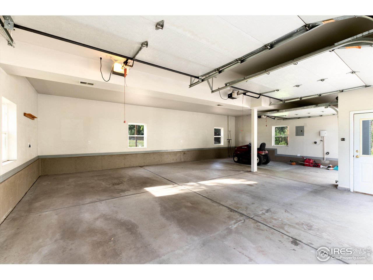 877 Apple Valley Road Lyons, CO 80540 - Photo 33 of 40 Large 3 Car Garage w/heat and A/C