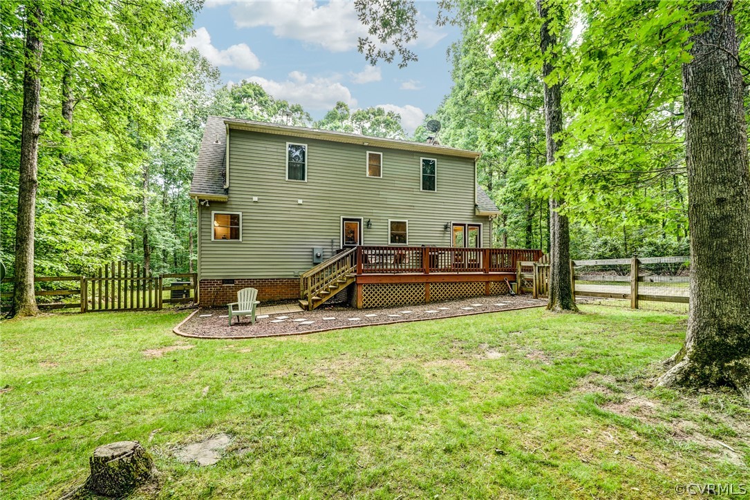135 Rolling Path Road Louisa, VA 23093 - Photo 42 of 43 a view of a house with backyard and sitting area