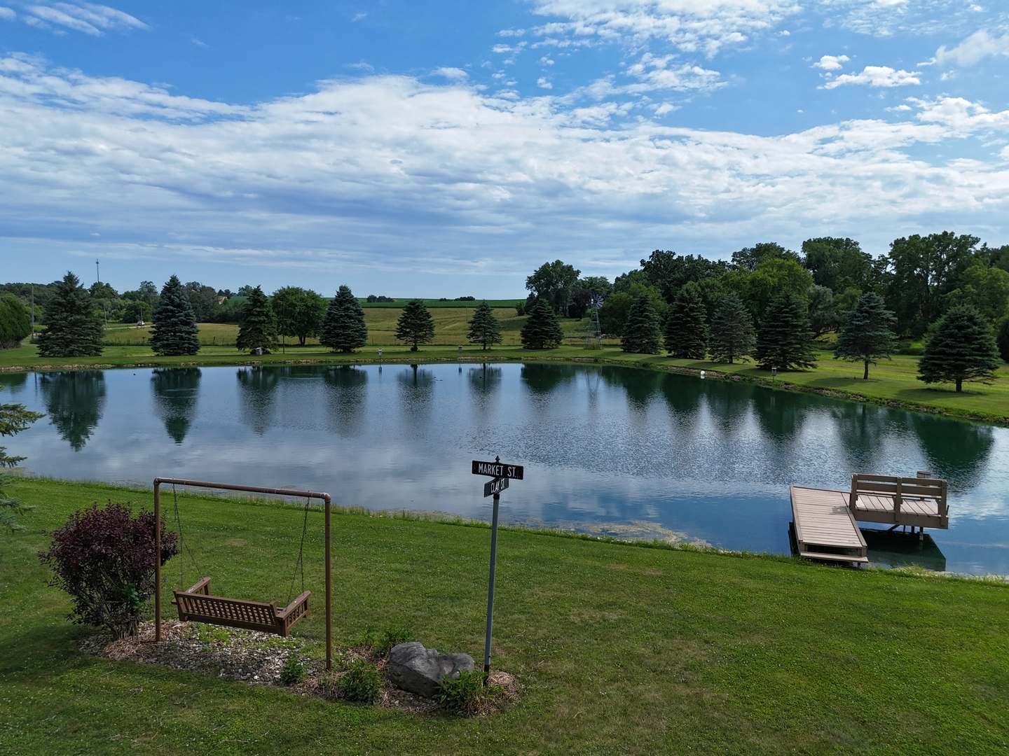 5782 North Brown Road Dakota, IL 61018 - Photo 14 of 49 a view of a lake with houses in the back