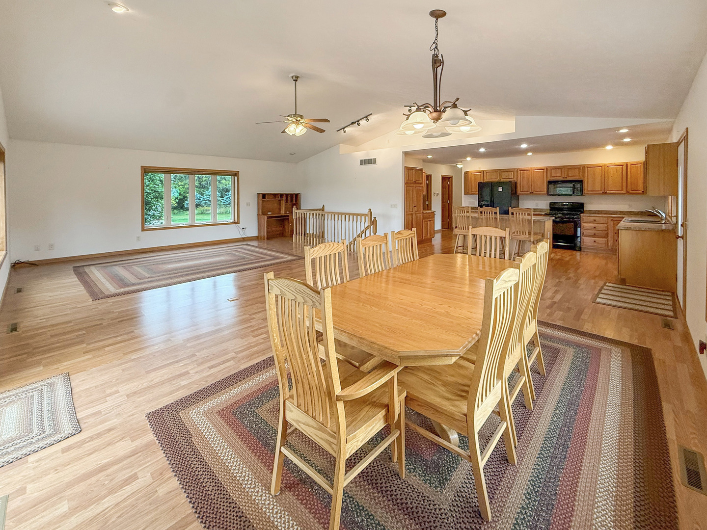 5782 North Brown Road Dakota, IL 61018 - Photo 20 of 46 a view of a dining room with furniture wooden floor and chandelier