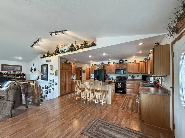 a kitchen with counter space cabinets and appliances
