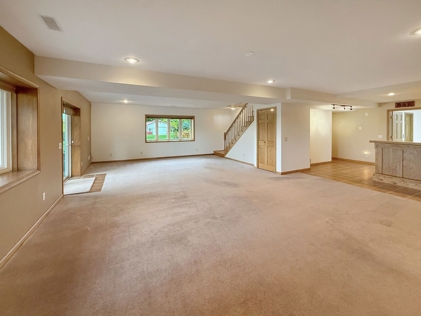 5782 North Brown Road Dakota, IL 61018 - Photo 36 of 49 an empty room with windows and view of a living room