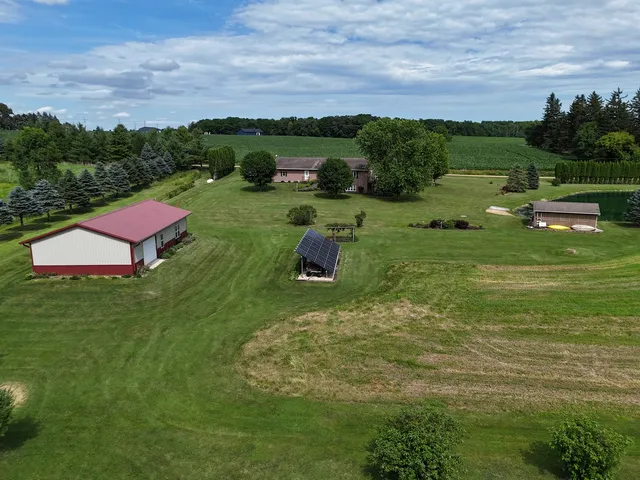 a view of a lake with a yard