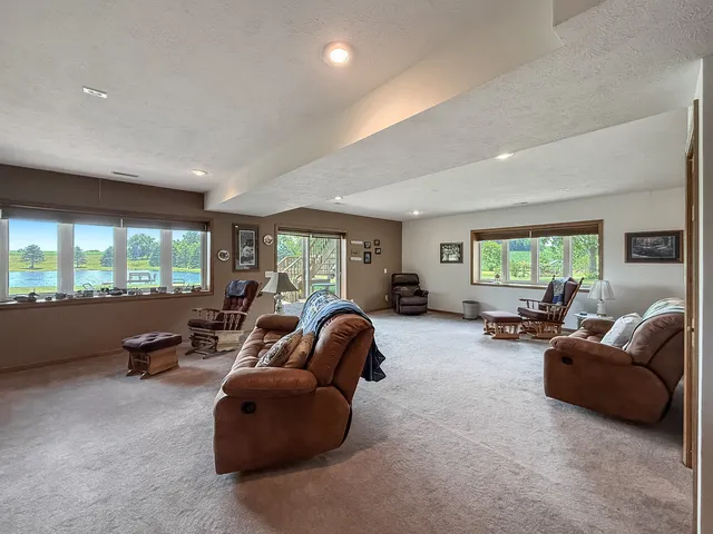 a bedroom with a bed and a dresser in it