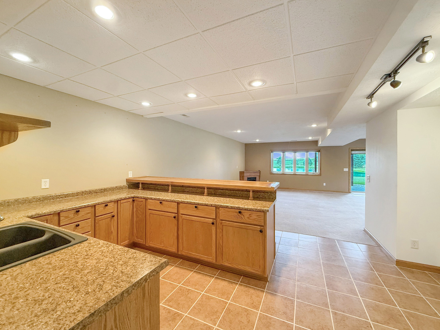 5782 North Brown Road Dakota, IL 61018 - Photo 45 of 46 a view of a kitchen with kitchen island a sink a counter top space and appliances