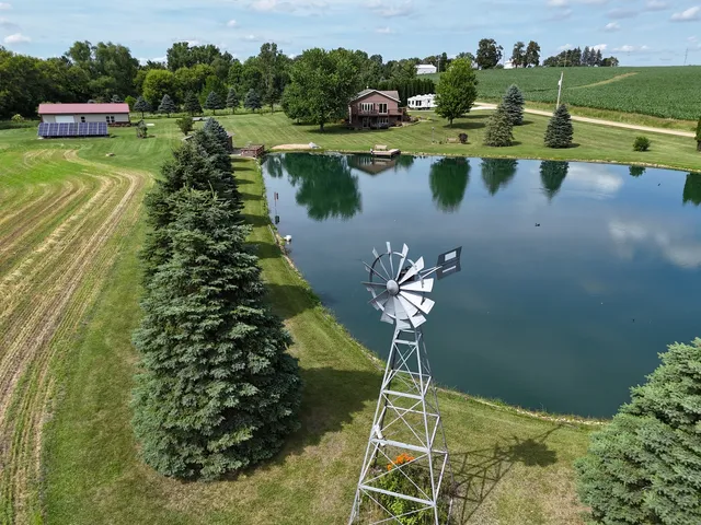 a view of a lake with a yard