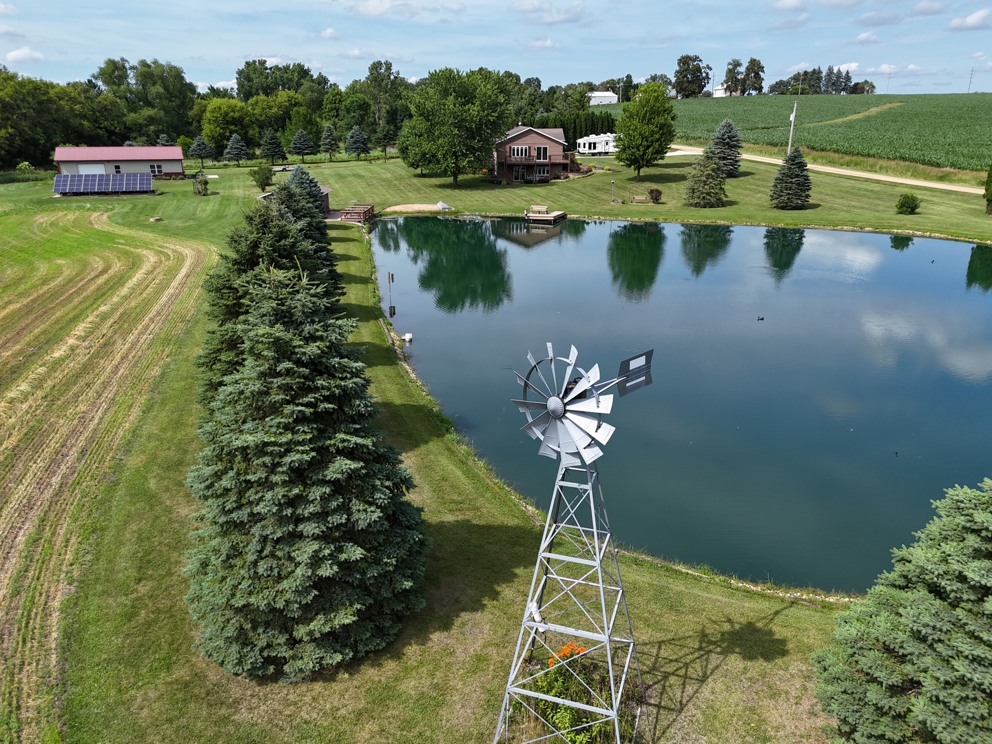 5782 North Brown Road Dakota, IL 61018 - Photo 8 of 49 a view of a lake with a yard