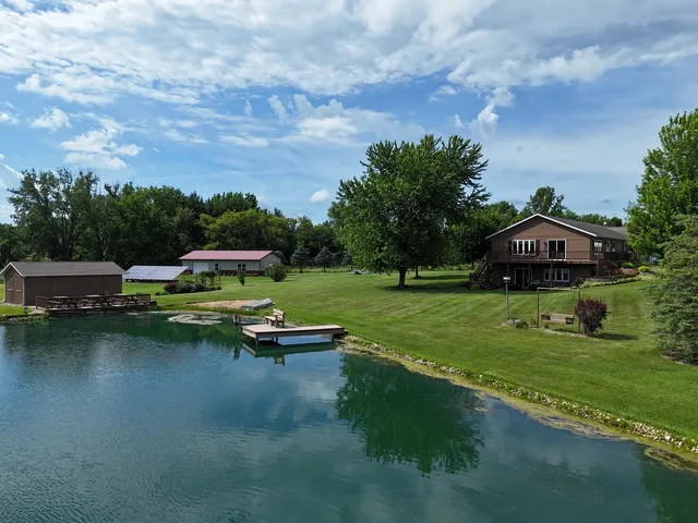 a view of lake with green space