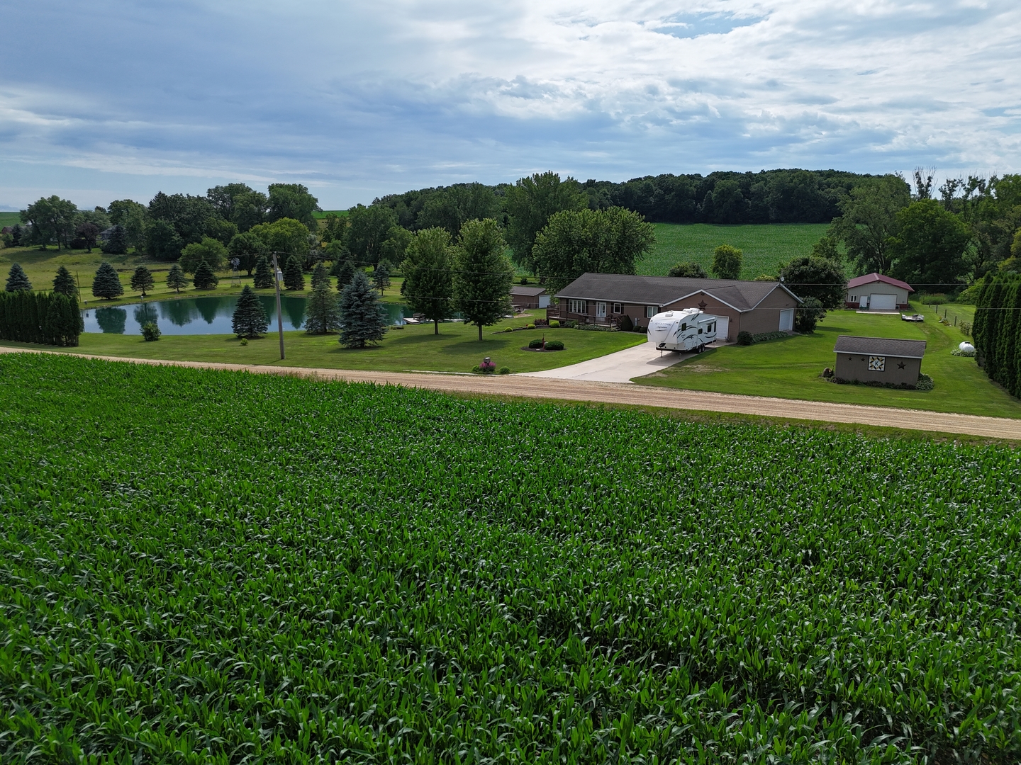 5782 North Brown Road Dakota, IL 61018 - Photo 9 of 49 a view of a green field with houses