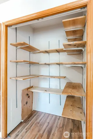 a view of a room with shelves