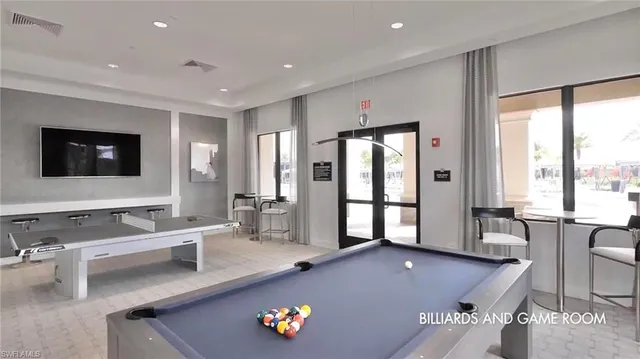 a sign that is sitting in front of a building