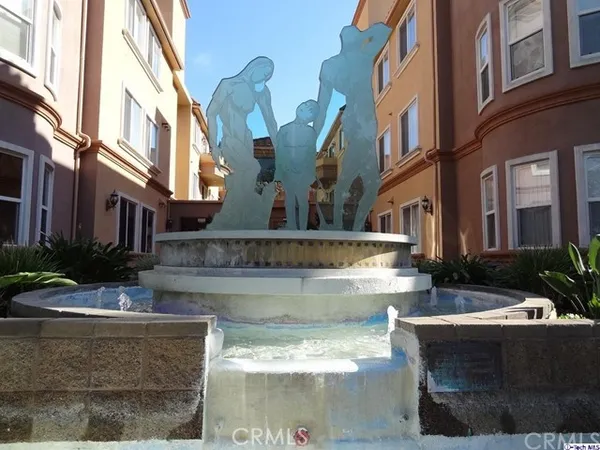 a view of a building with swimming pool