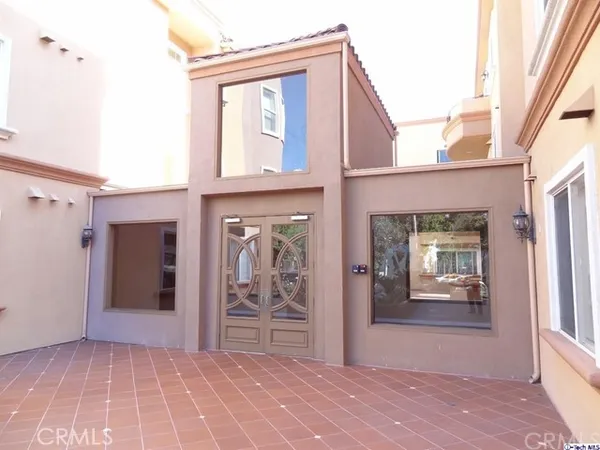 front view of a house with a glass door