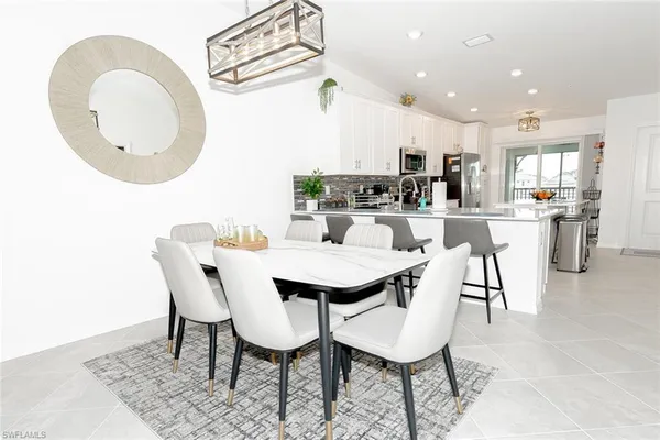a view of a dining room with furniture