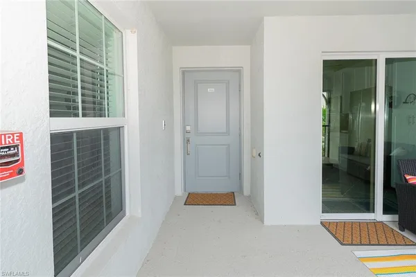 a view of front door with balcony