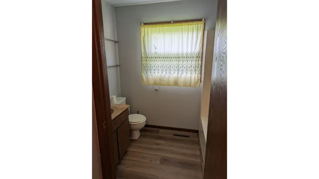 a bathroom with a toilet