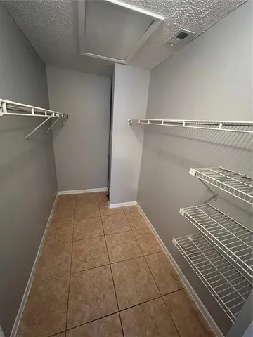 a bathroom with a sink mirror vanity and toilet