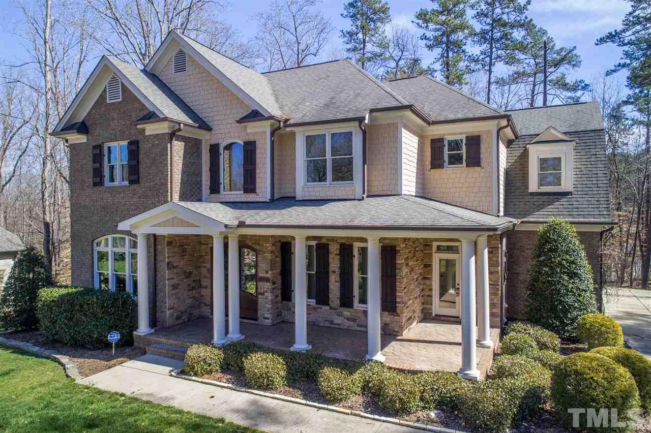 9008 Albatross Court Raleigh, NC 27613 - Photo 1 of 25 front view of a house with a yard