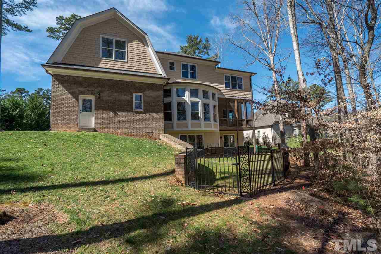 9008 Albatross Court Raleigh, NC 27613 - Photo 25 of 25 a front view of a house with a yard