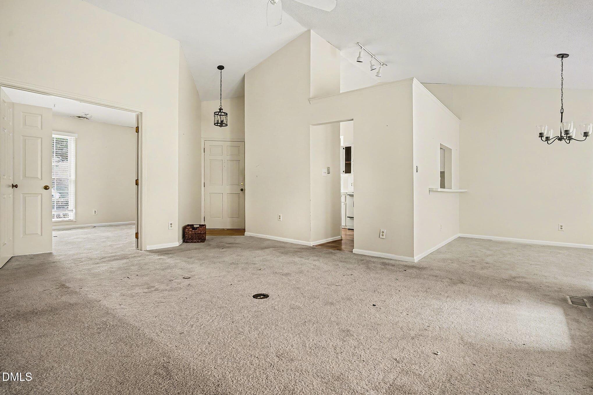 1201 Deptford Court Raleigh, NC 27609 - Photo 13 of 20 a view of a big room with closet and windows