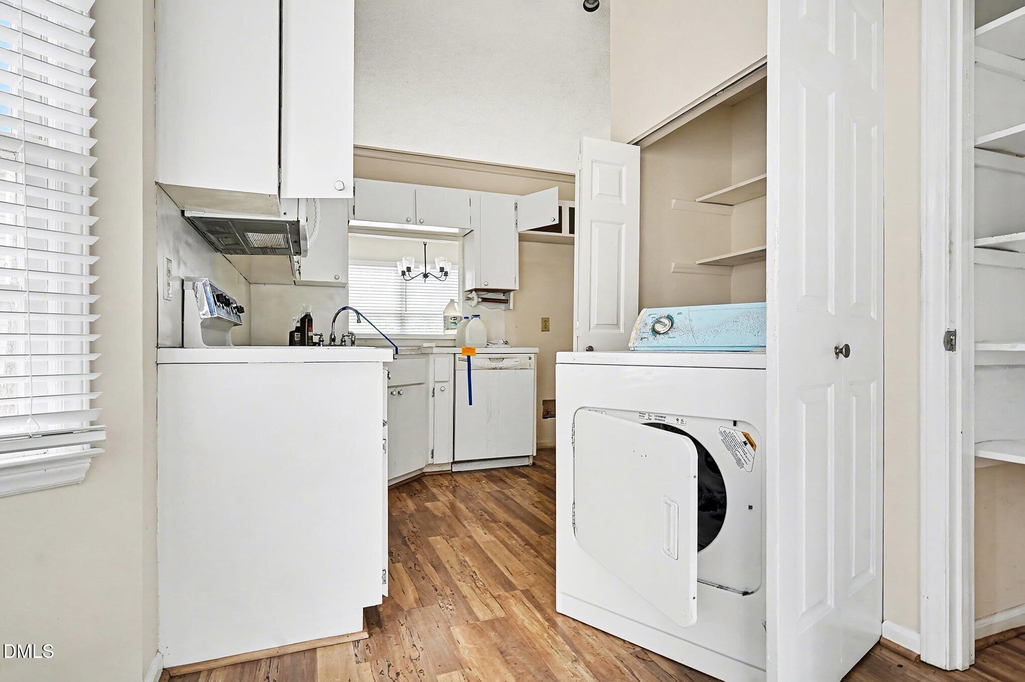 1201 Deptford Court Raleigh, NC 27609 - Photo 7 of 20 a view of a kitchen with sink and washer
