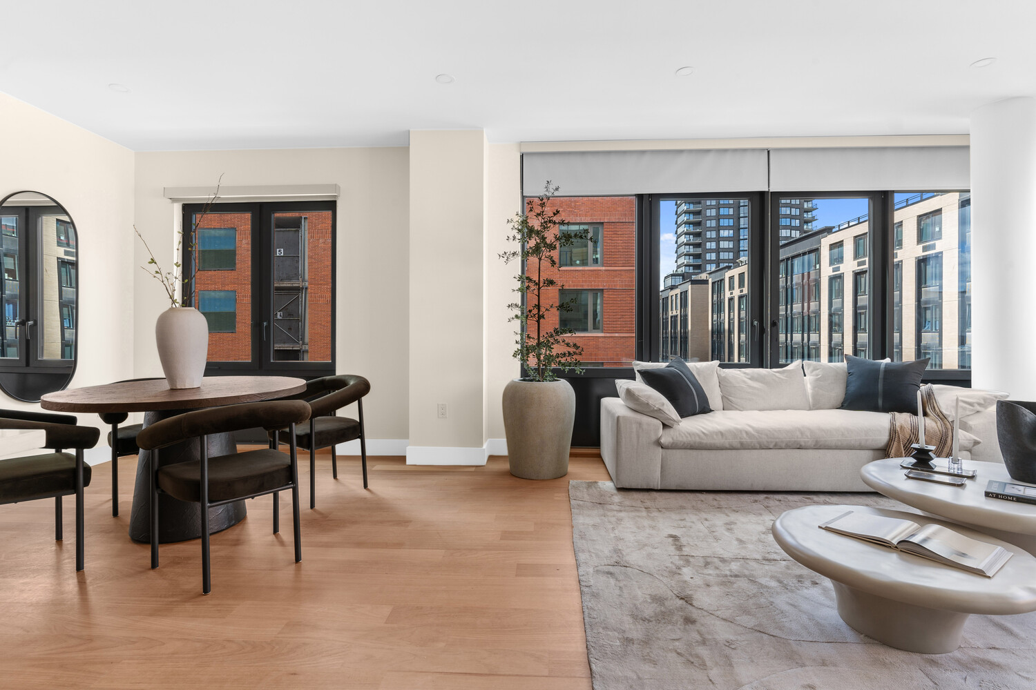 36 India Street, Unit 4F Brooklyn, NY 11222 - Photo 1 of 16 a living room with furniture and a large window