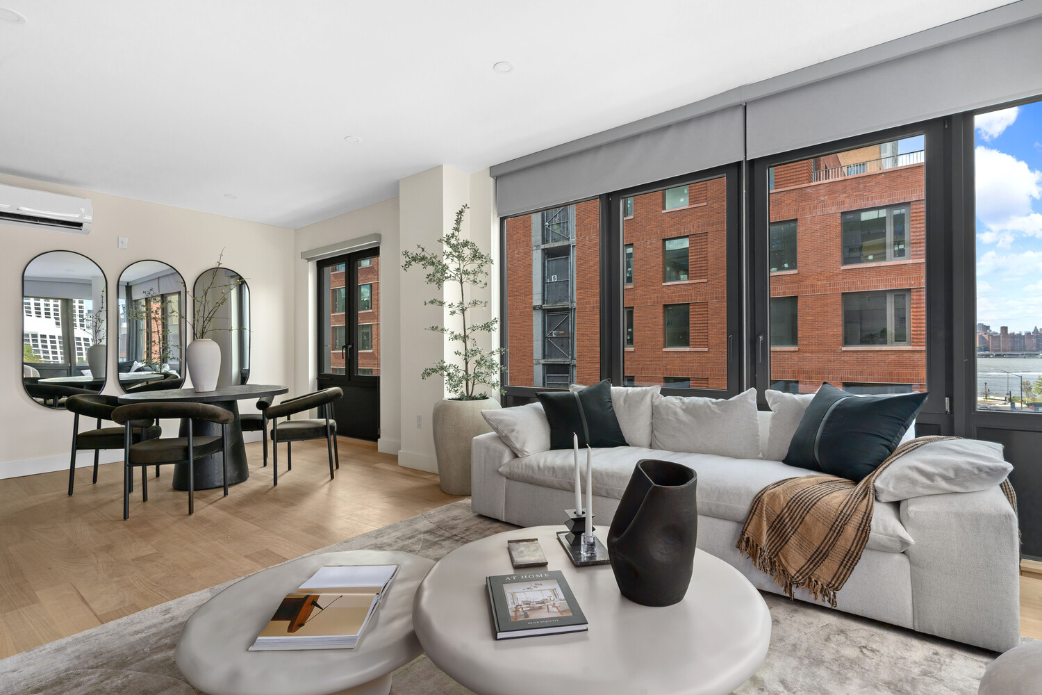 36 India Street, Unit 4F Brooklyn, NY 11222 - Photo 3 of 16 a living room with furniture and a large window