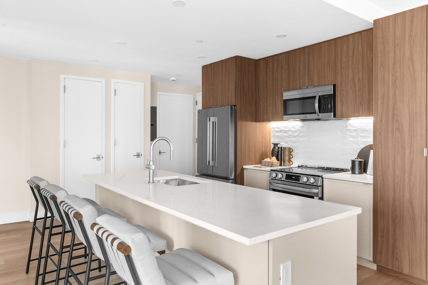 36 India Street, Unit 4F Brooklyn, NY 11222 - Photo 5 of 16 a kitchen with stainless steel appliances a stove a sink and a refrigerator