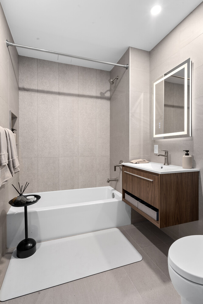 36 India Street, Unit 4F Brooklyn, NY 11222 - Photo 9 of 16 a bathroom with a sink a toilet and a bathtub