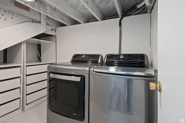 1214 North 300 West Mapleton, UT 84664 - Photo 16 of 33 Dedicated laundry area featuring includedl washer and dryer pair with storage with drawers and shelving