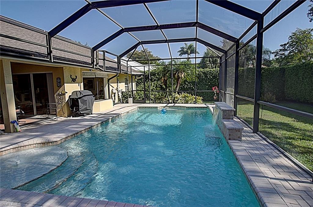 6706 Mill Run Road Naples, FL 34109 - Photo 20 of 20 a view of a house with backyard and porch