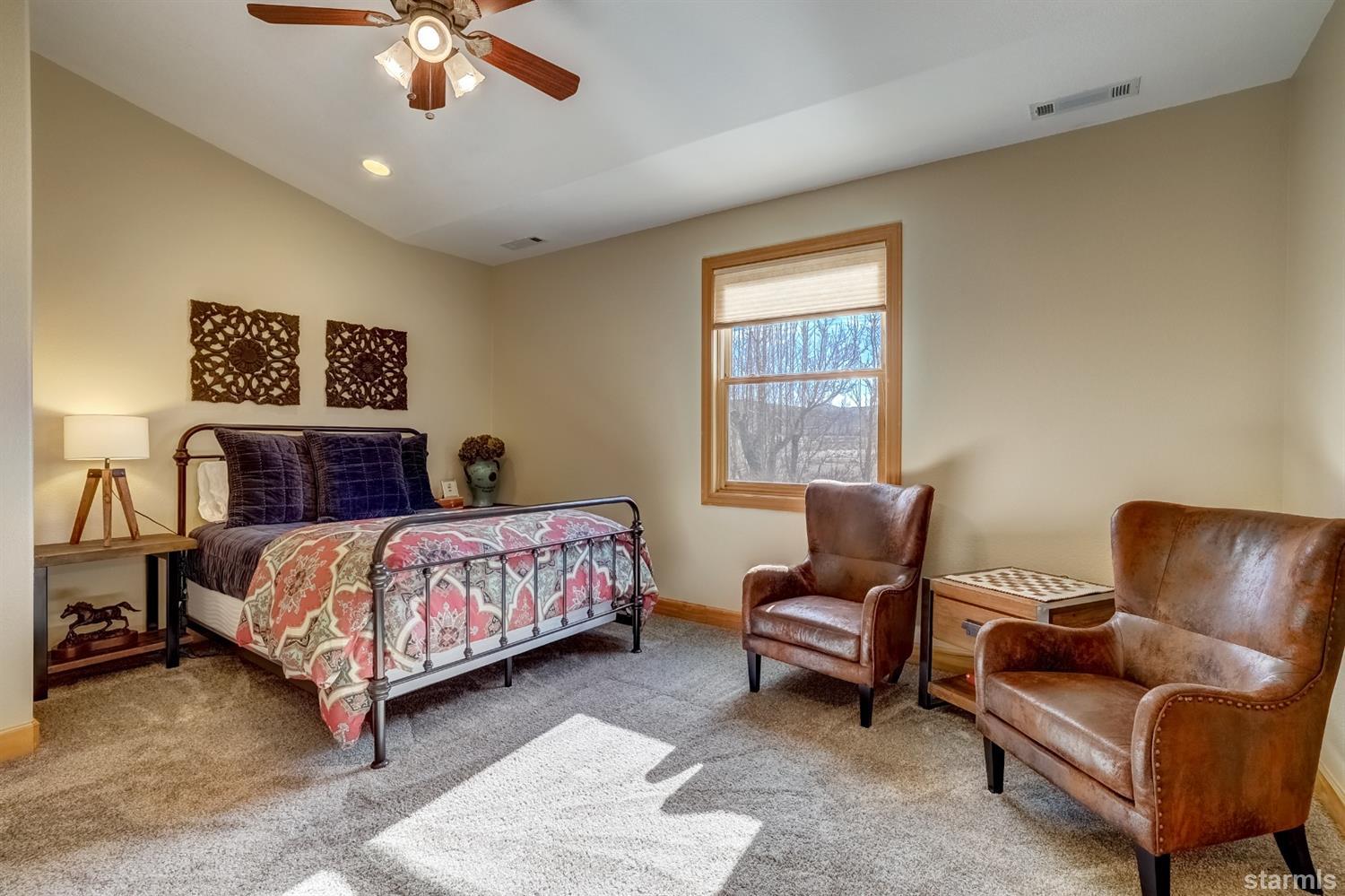 420 River Ranch Road Woodfords, CA 96120 - Photo 15 of 25 a bedroom with a bed and furniture