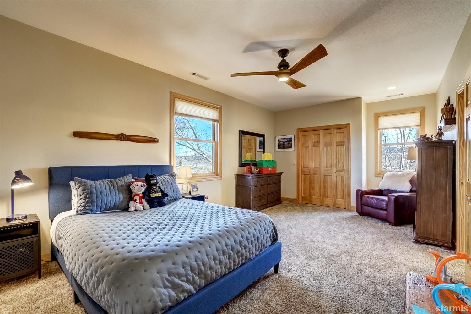 420 River Ranch Road Woodfords, CA 96120 - Photo 17 of 25 a bedroom with a bed and furniture