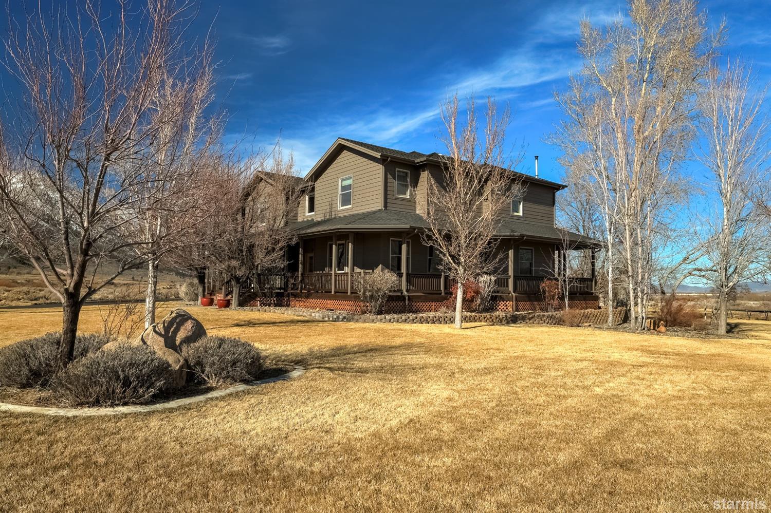 420 River Ranch Road Woodfords, CA 96120 - Photo 21 of 25 a view of a house with a yard and tree s