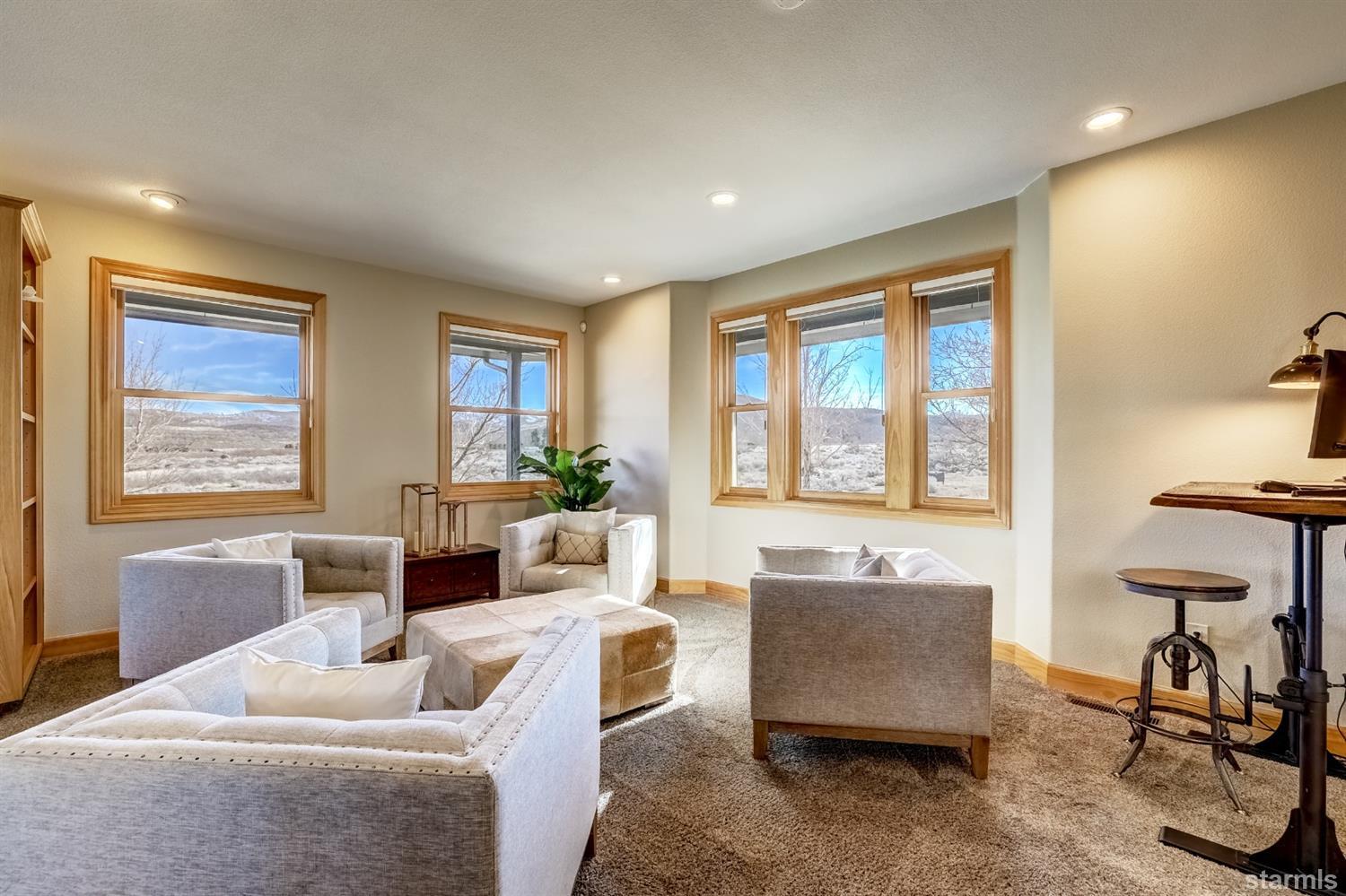 420 River Ranch Road Woodfords, CA 96120 - Photo 8 of 25 a living room with furniture and a window