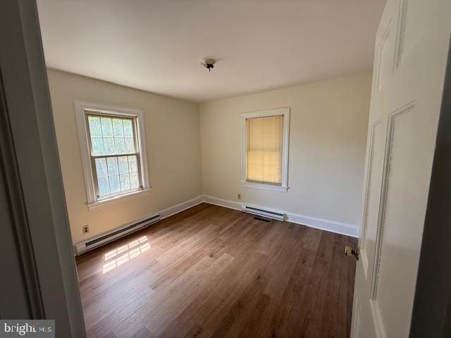 28955 Log Cabin Road Salisbury, MD 21801 - Photo 33 of 39 a view of an empty room with wooden floor and a window