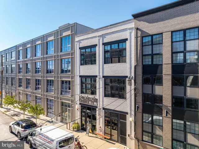 a view of a balcony with chairs