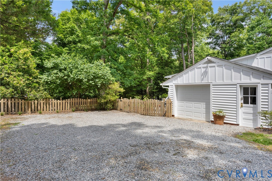 3136 Old Quarry Road Richmond, VA 23225 - Photo 10 of 39 Gravel driveway with an attached garage featuring