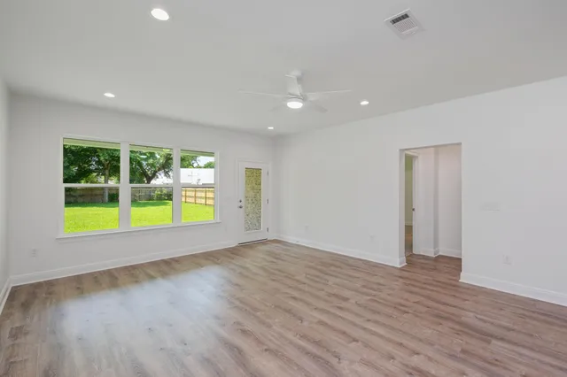 a view of entryway with wooden floor